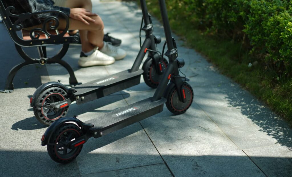 two scooters standing near