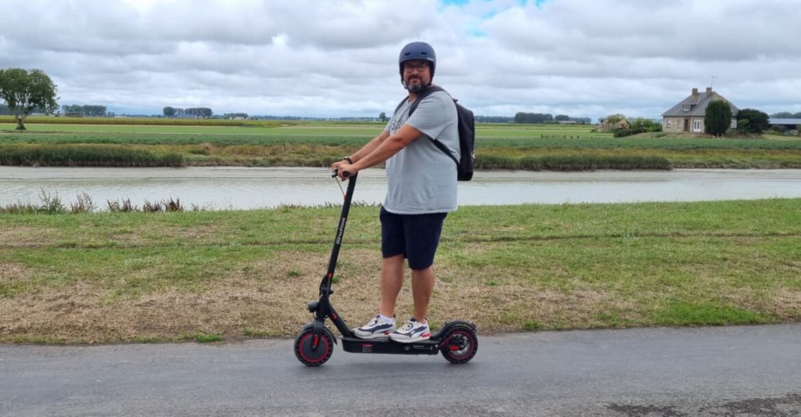 person riding on isinwheel scooter